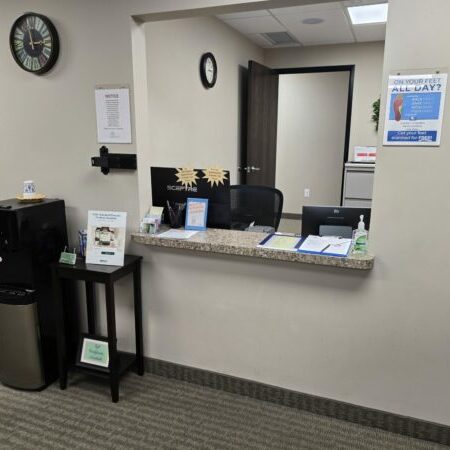 Front desk reception area in office.