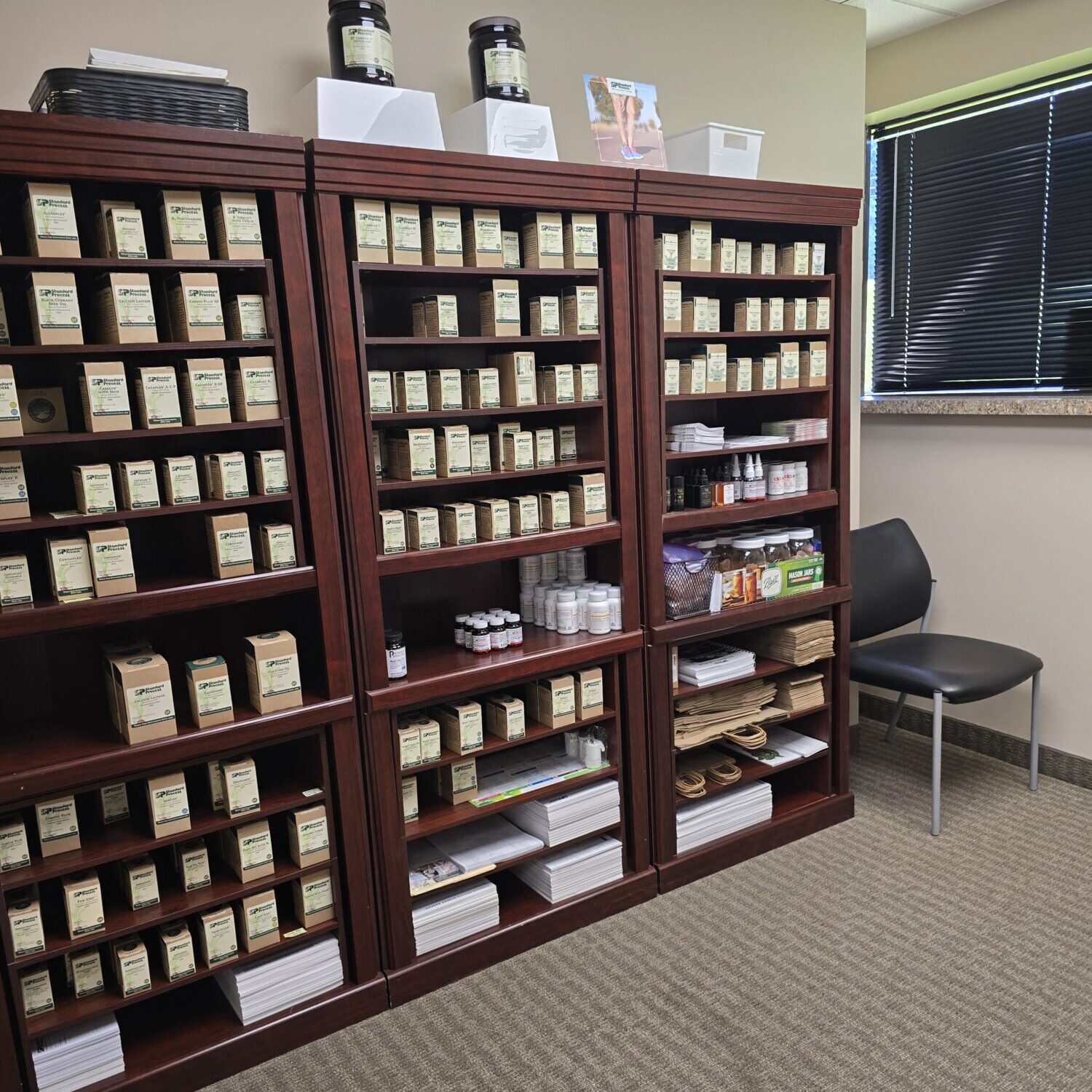 Shelves filled with herbal tea and supplements.